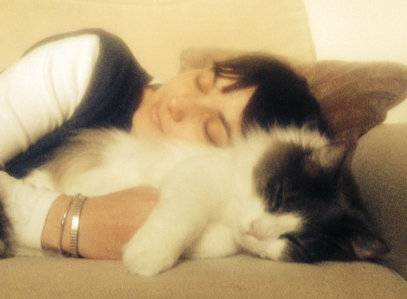 Picture of Ella with a cat